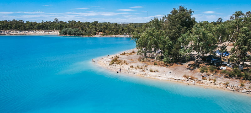Campsites along the edge of Stockton Lake near Collie in Western Australia