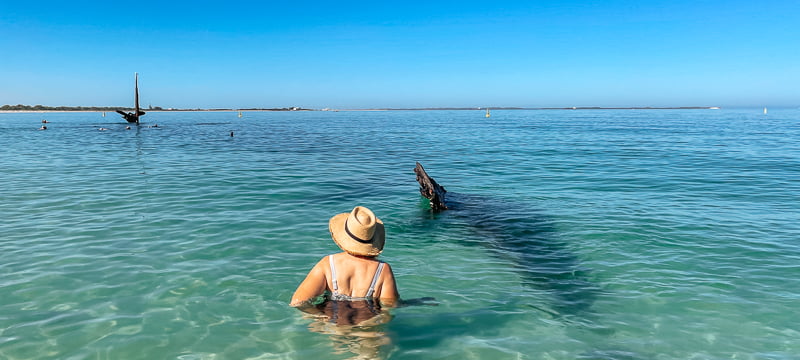 In the water next to the Omeo Shipwreck at Coogee Beach in Perth